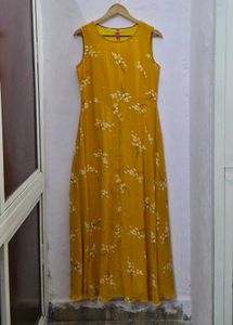 Mustard floral printed maxi skater dress.