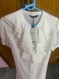 Elegant White Ruffled Blouse