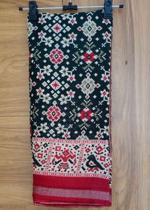 Elegant Dark Saree with Traditional Print