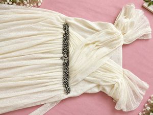 Elegant White Gown with Embellished Belt