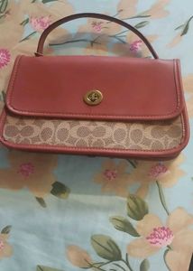 Coach Signature Monogram Handbag