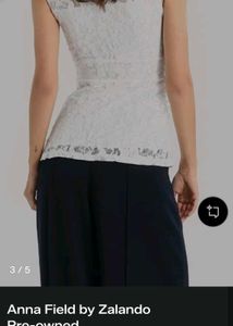 Elegant White Lace Sleeveless Top little deep neck