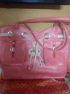 Stylish Pink Handbag with Drawstring Detail