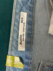 Light Wash Flared Jeans with Side Slits
