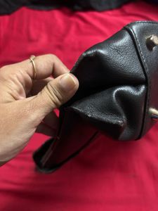 Chic Black Handbag with Gold G Logo