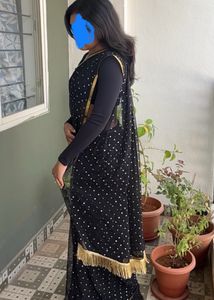 Black Saree With Golden Booty