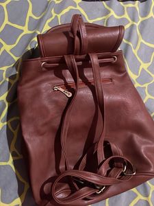 Stylish Brown Backpack Button Damaged
