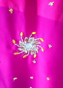 Elegant Pink Saree with Gold Embellishments