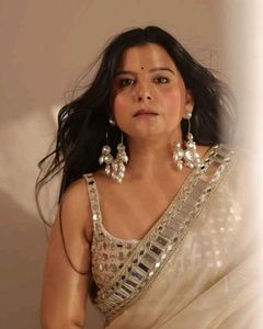 Elegant Cream Saree with Embellished Blouse