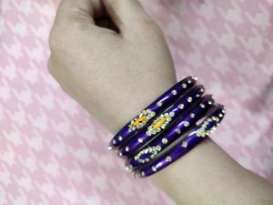 Set Of 4 New Purple Bangles