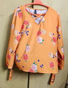 Orange Floral Print Top with Criss-Cross Neckline