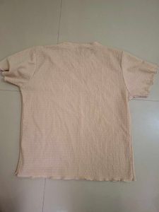 Cream Textured Top with Black Flower Applique