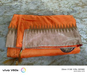 Vibrant Orange Saree with Golden Border