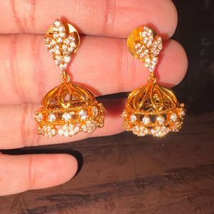 Elegant Gold Jhumka Earrings with Stones