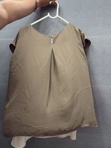 olive and white top