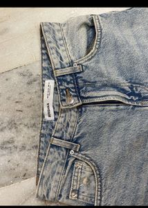Distressed Light Wash Denim Jeans