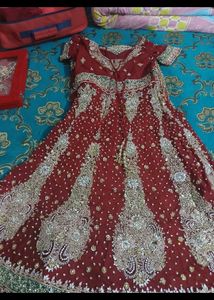 Exquisite Embroidered Maroon Anarkali