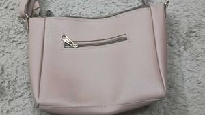 Pink/Peach sling bag &amp; a black one free
