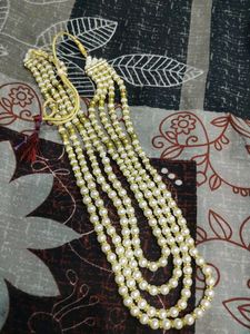 Elegant Pearl and Gold Necklace