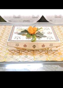 10. Decorative Gift Box with Floral Accent