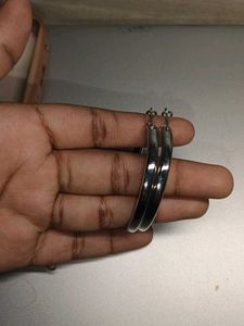 set of 3 hoops and a green meenakari earrings