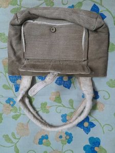 Brown cloth handbag