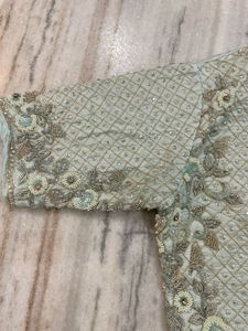 Elegant Mint Green Embellished Lehenga Choli