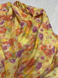 Beautiful Yellow Saree With Floral Design