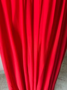 Elegant Red Gown with Embellished Neckline
