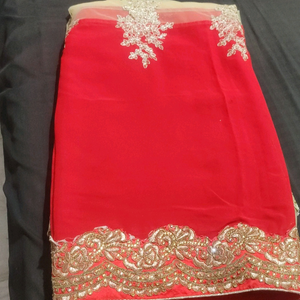 beautiful upper half red and lower glod saree with