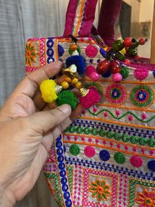 Embroidered Hobo Bag with Tassels