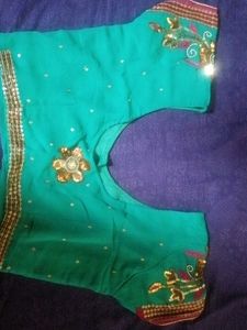 Embellished Teal lehenga Saree with Floral Motifs