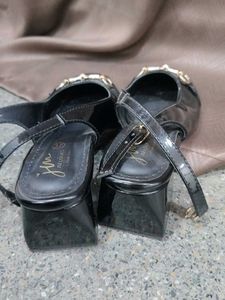 Chic Black Patent Heels with Gold Buckle