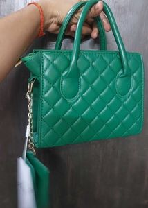 Quilted Green Handbag with a extra sling and pouch