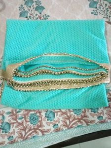 Beautiful Turquoise Saree with Gold Border