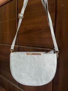 Grey half moon sling bag