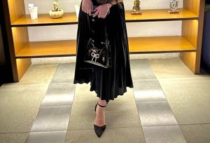 Chic Black Patent Bow Handbag
