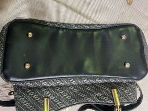 Stylish Textured Handbag with Leaf Charm