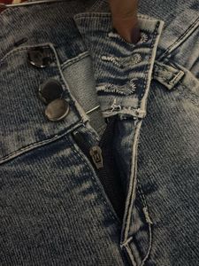 Distressed Denim Jeans with 'Girl' Graphic