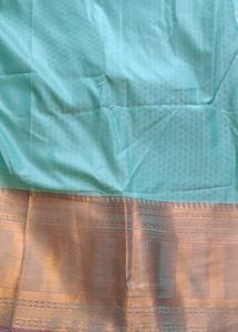 Elegant Turquoise Saree with Gold Border