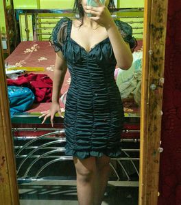713. Chic Black Ruched Mini Dress