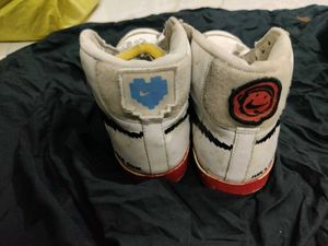 Nike Worn White High-Top Sneakers