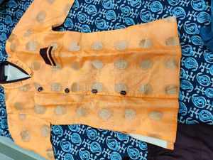 Orange Kurta with brown dhoti
