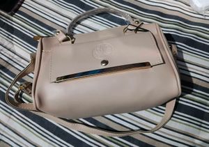 Chic Beige Handbag with Gold Accents