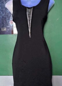 Sleek Black Dress with Silver Embellishment