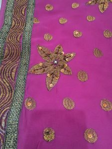 Stunning Pink Saree with Gold Embellishments