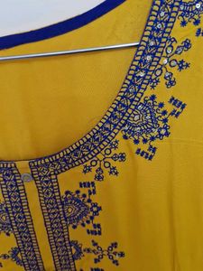 Elegant Yellow Kurta with Embellished Neckline