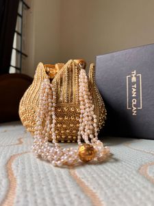 Elegant Gold Embellished Potli Bag