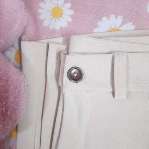 Beige High-Waist Women's trousers.