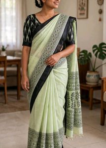 Elegant Pastel green Saree with Black Print
